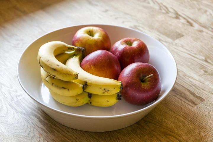 Apples and bananas. Photo by Martin Carlsson/ShutterStock.