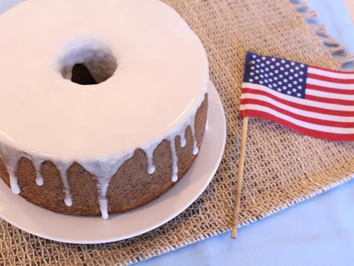 election day cake on a plate with an american flag next to it
