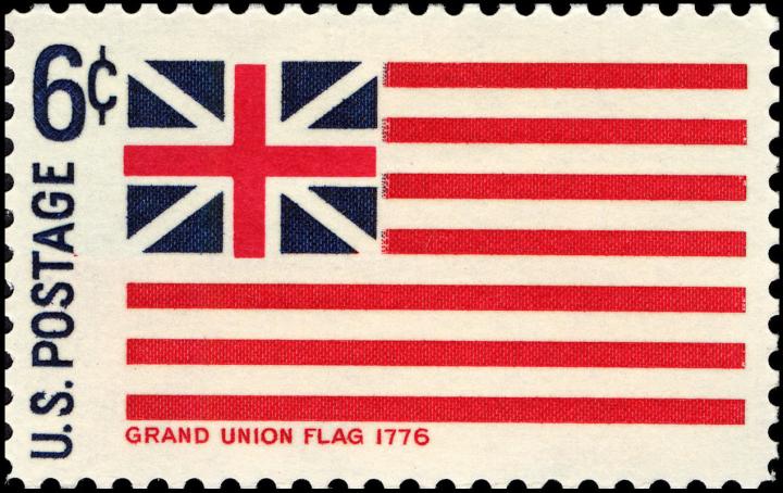 The Grand Union Flag, the original flag of the United States, represented here on a 1968 postal stamp.
