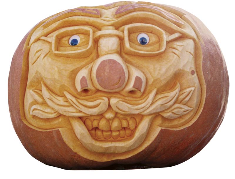 three dimensional carved pumpkin face jack-o’-lantern with mustache