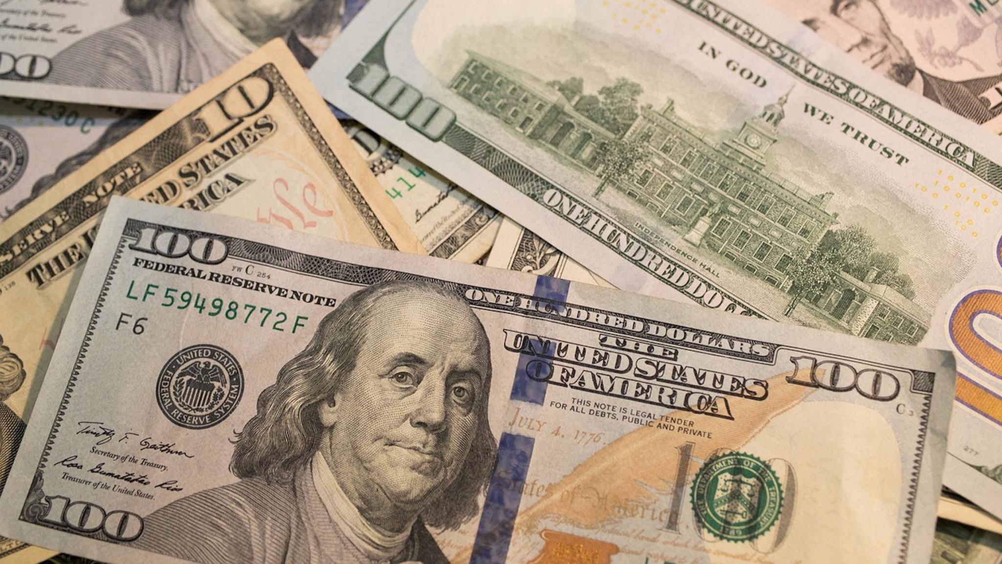 An engraving of Benjamin Franklin's face is on the $100 bill. 