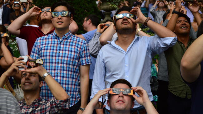 wearing eclipse glasses