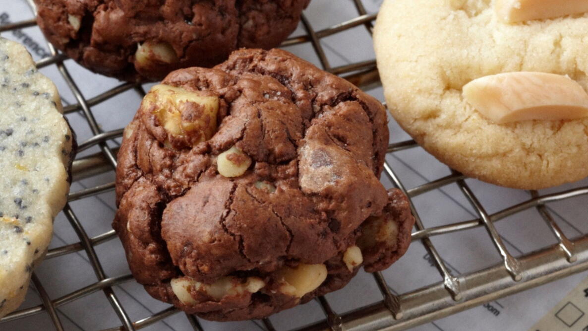 Dark Chocolate Chile Ball cookie sitting on a cooling rack