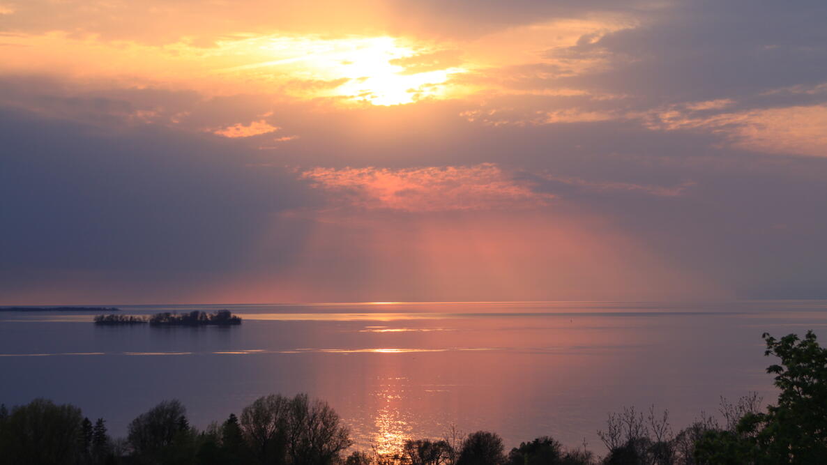 sun in the evening over lake ontario