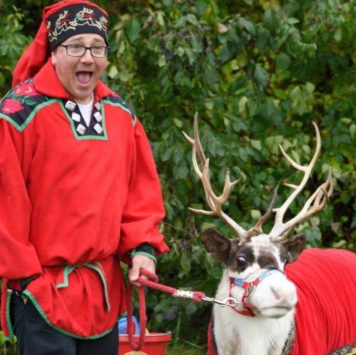 riendeer and elf at the Reindeer Farm 