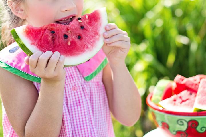 Child eating watermelon